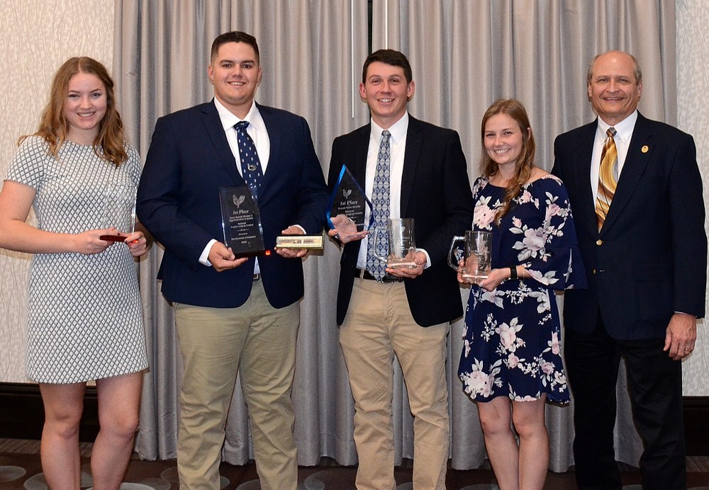 Penn State’s first place poultry judging team, from left: Morgan Watt, Rogen Shaffer, Jonathan Nace, Brooke Kline and Coach Philip Clauer.