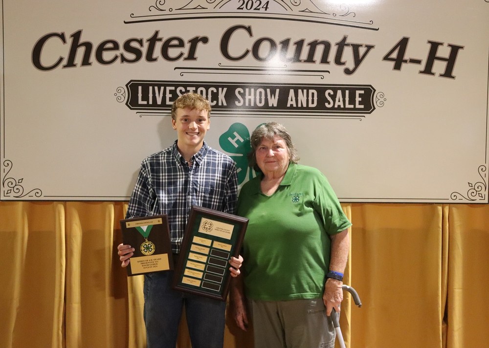 Spirit of 4-H Award winner, David Gober, and his club leader, Davida Waters.