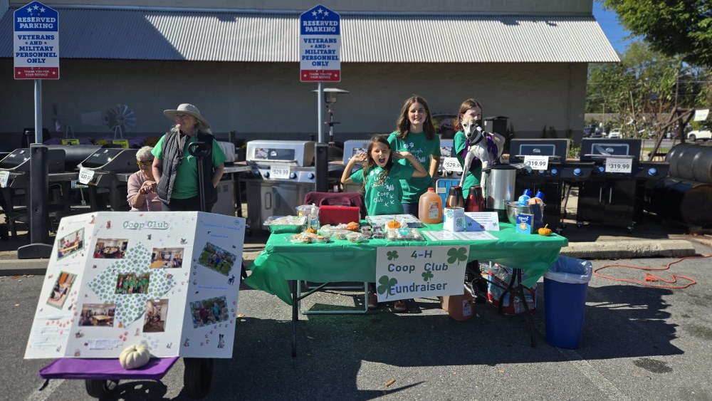 Lehigh 4-H Coop Club Fundraiser 4-H Leader Bernie McGraw-Mann and 4-H Members Emma Olmstead, Zoe Cole, and Hannah Keberlein hosting a 4-H fundraiser