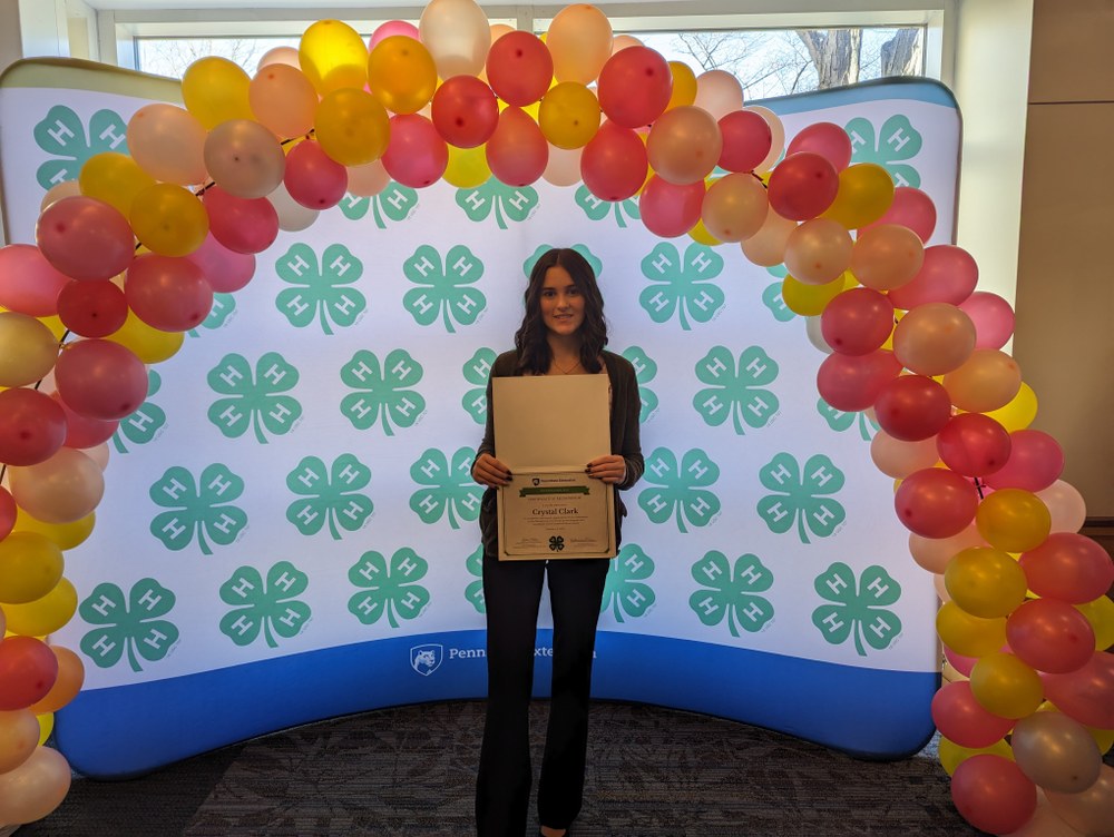Crystal Clark Recognized with PA Diamond Clover Award Crystal Clark with her PA 4-H Diamond Award at the State Leadership Conference