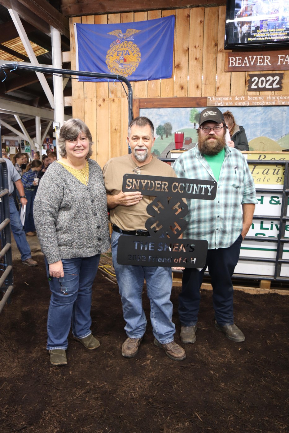 Snyder County 4-H Presents the 2022 Friend of 4-H Award Pictured left to right: Kathy, Brian and Matthew Shea with the metal award they received for this honor.