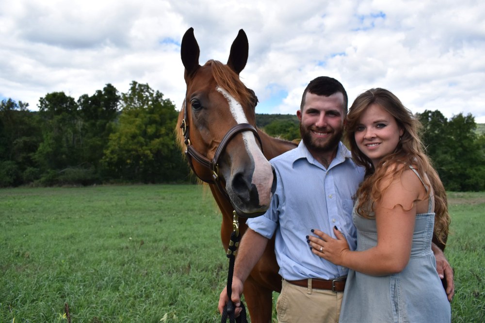 Alumni: 4-H Planted Their Future Success Tyler Shaw and Karoline Kent with one of their farm’s horses. Photo Credit: Madison Shaw