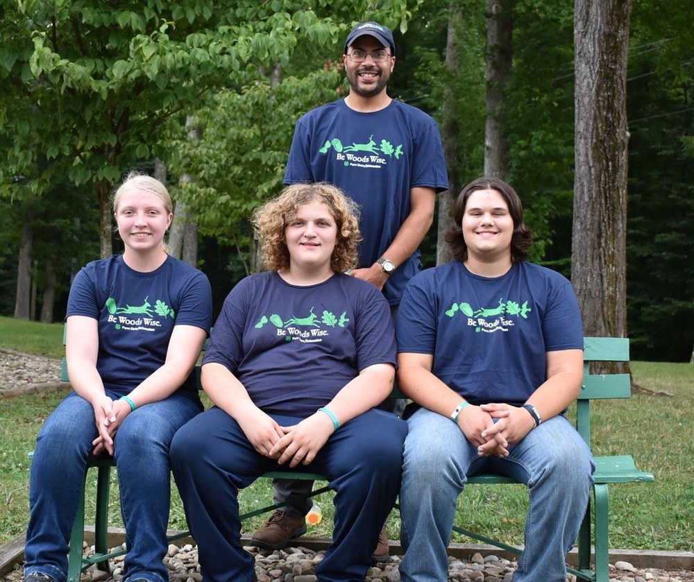 Pennsylvania Team Competes in National 4-H Forestry Invitational Team members, seated left to right: Lily Palfrey, Garrett Franck, Brandon Shrodo. Standing: Paul McFarland Jr., coach